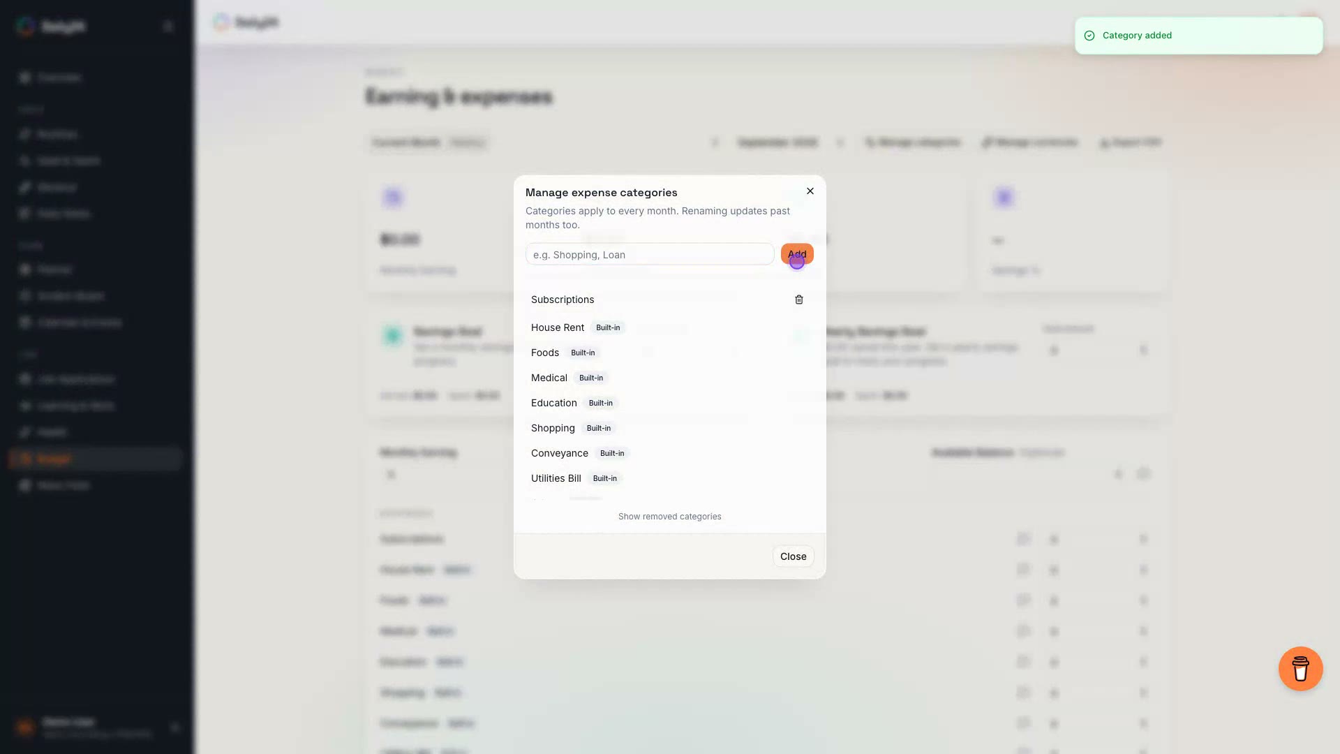 Budget demo: creating a custom expense category, logging earnings and expenses, setting a savings goal, and viewing the month in history